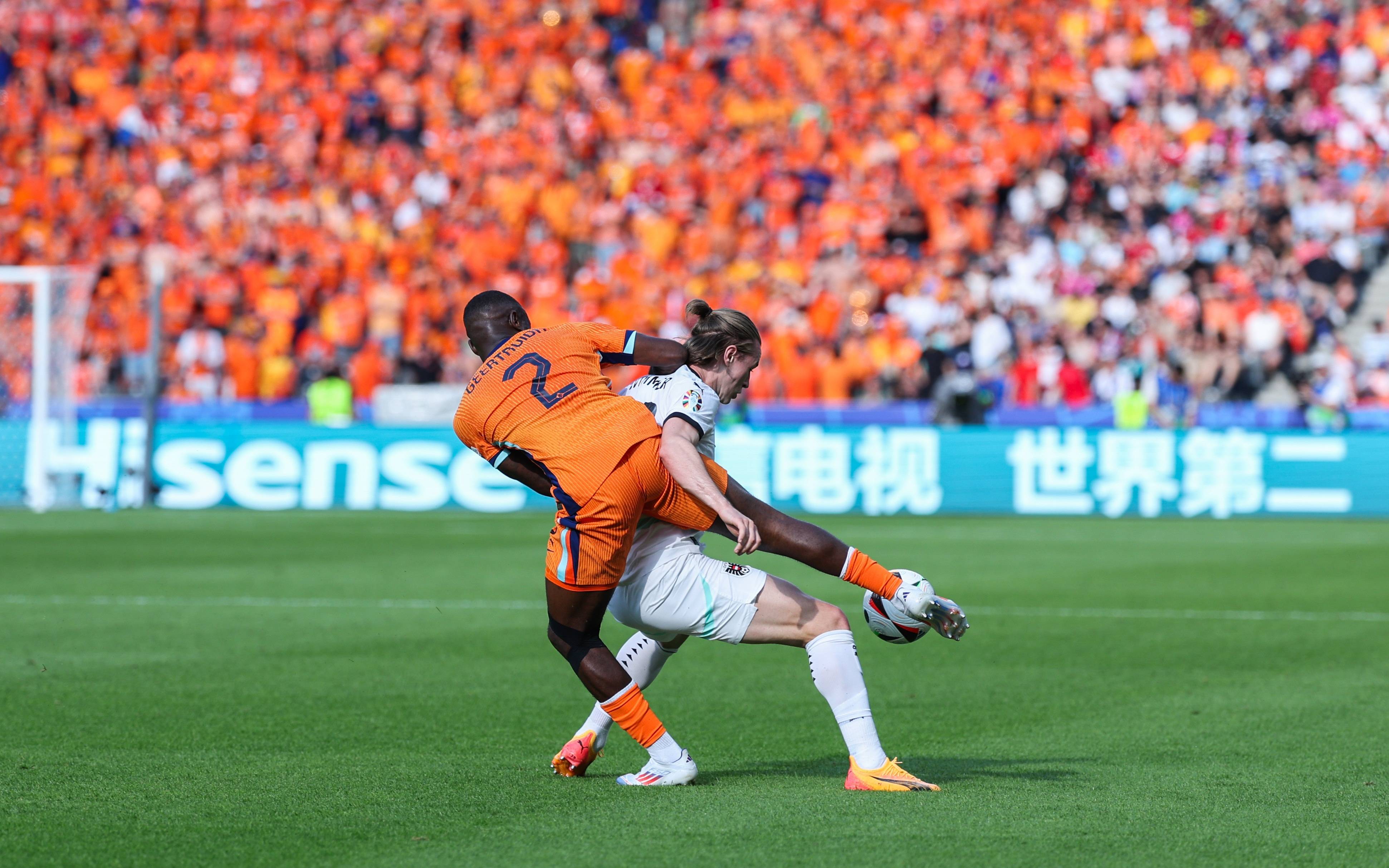 奥地利队主帅强调整体团结合作精神的简单介绍